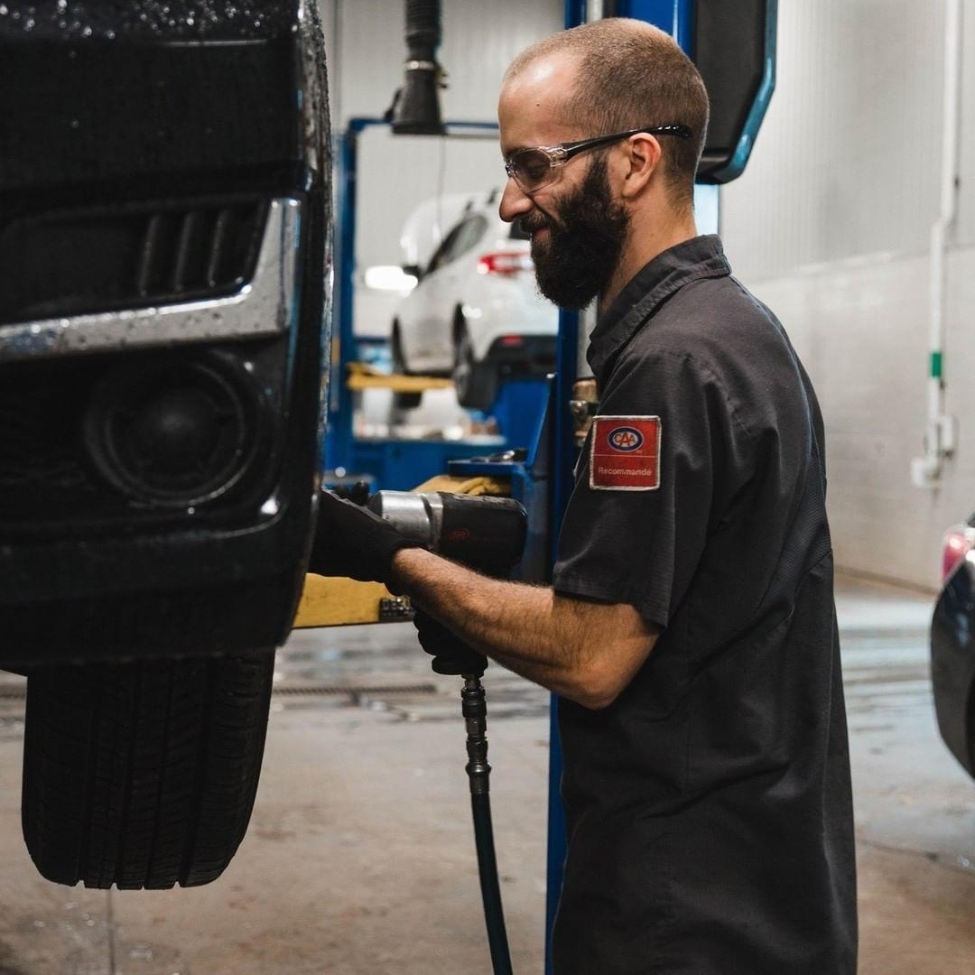 Wheel and tire repair by a specialized Subaru technician.